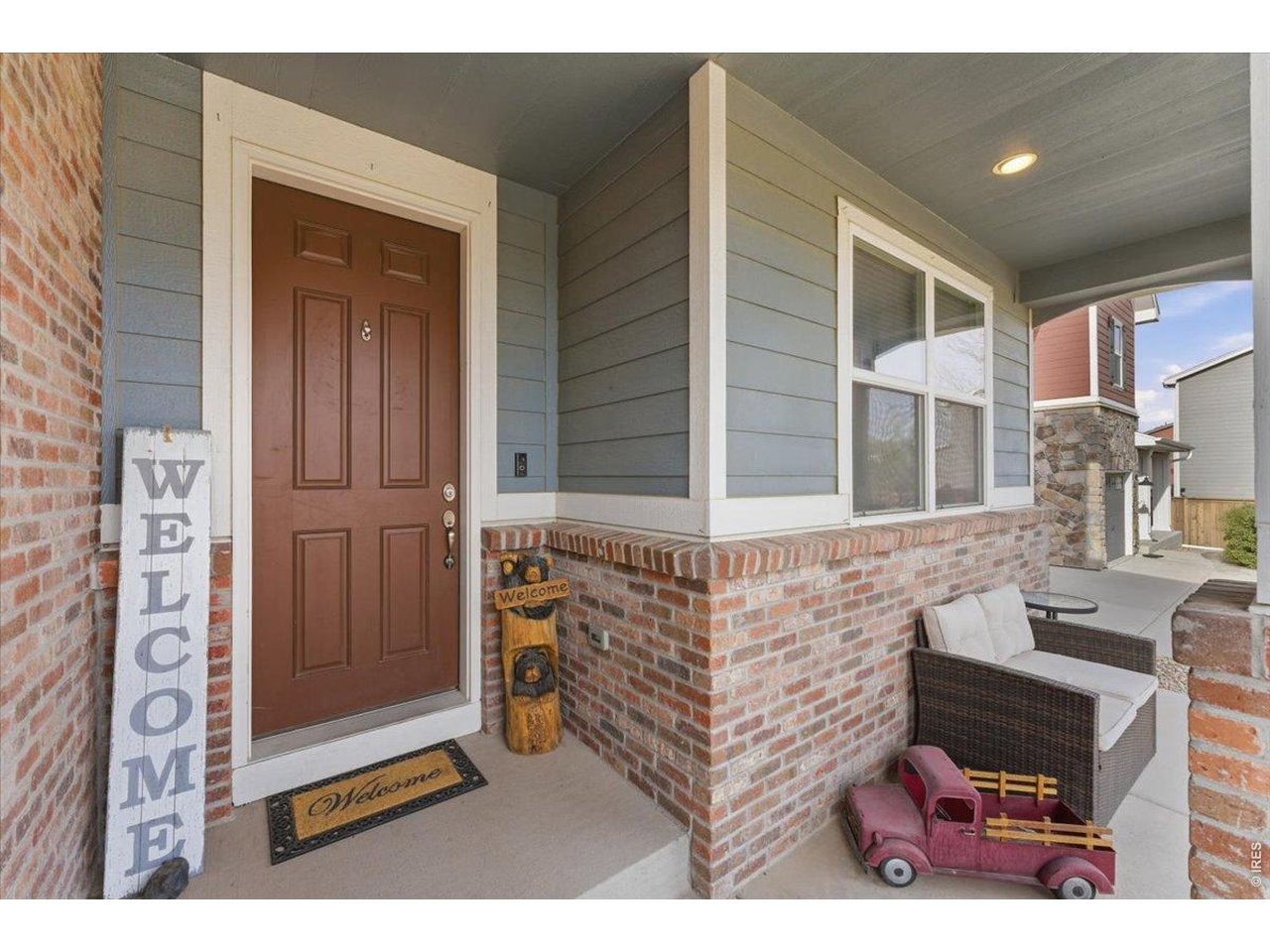 1148 Wagon Bend Road Berthoud, CO 80513 - Photo 6 of 50 a balcony with furniture and a window