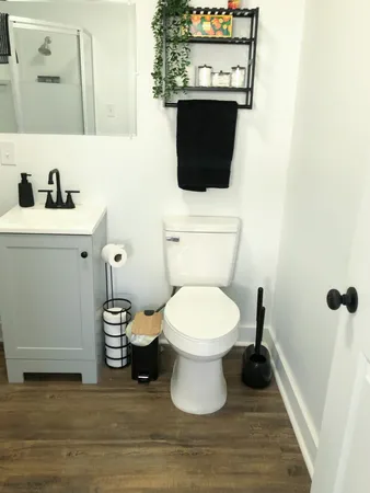 a bathroom with a glass shower door