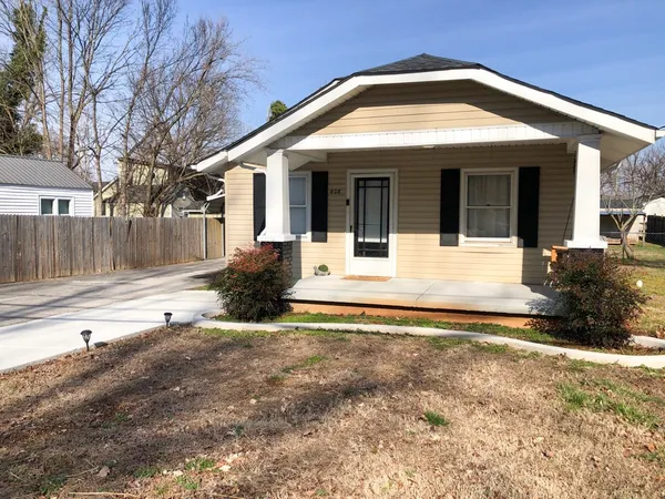 a view of kitchen with furniture and flat screen tv