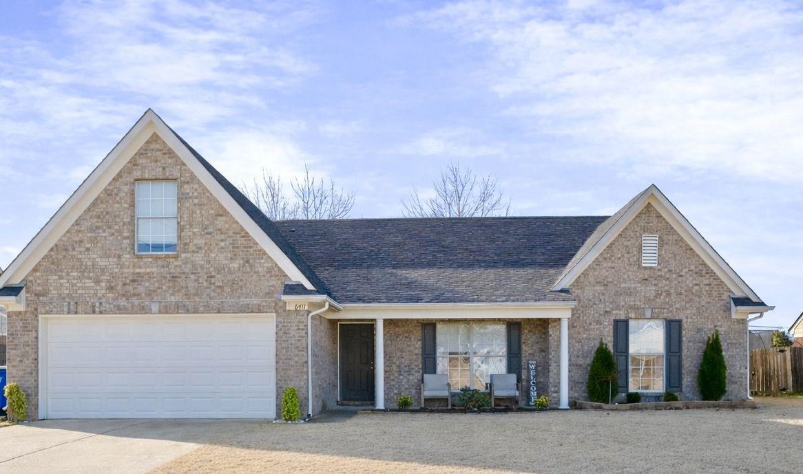 6411 Sandbourne West Olive Branch, MS 38654 - Photo 15 of 22 a front view of a house with garage