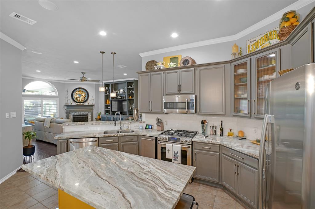 a large kitchen with cabinets