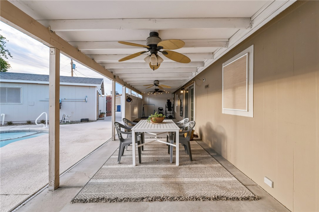 1996 Ramar Road Bullhead City, AZ 86442 - Photo 33 of 65 This property features an inviting covered patio with ceiling fans, ideal for outdoor gatherings