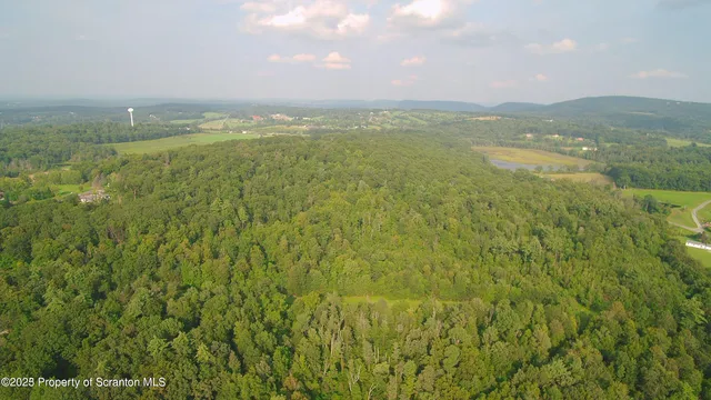 a view of an ocean and a mountain
