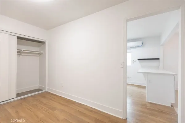 a view of an empty walk in closet
