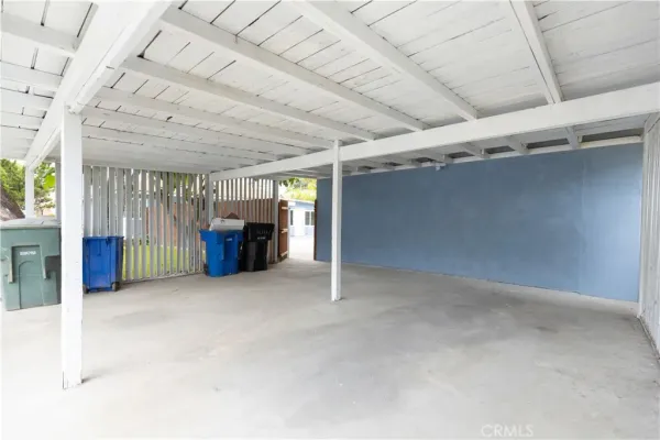 a view of empty room with furniture