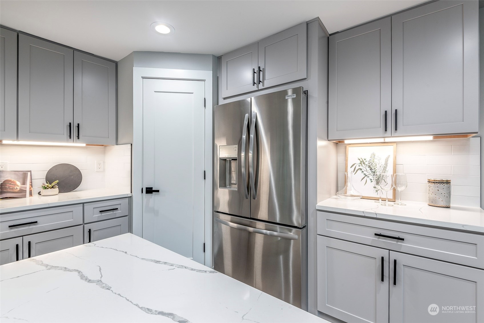 1582 Rainier Drive Fircrest, WA 98466 - Photo 13 of 40 a kitchen with a refrigerator and a sink