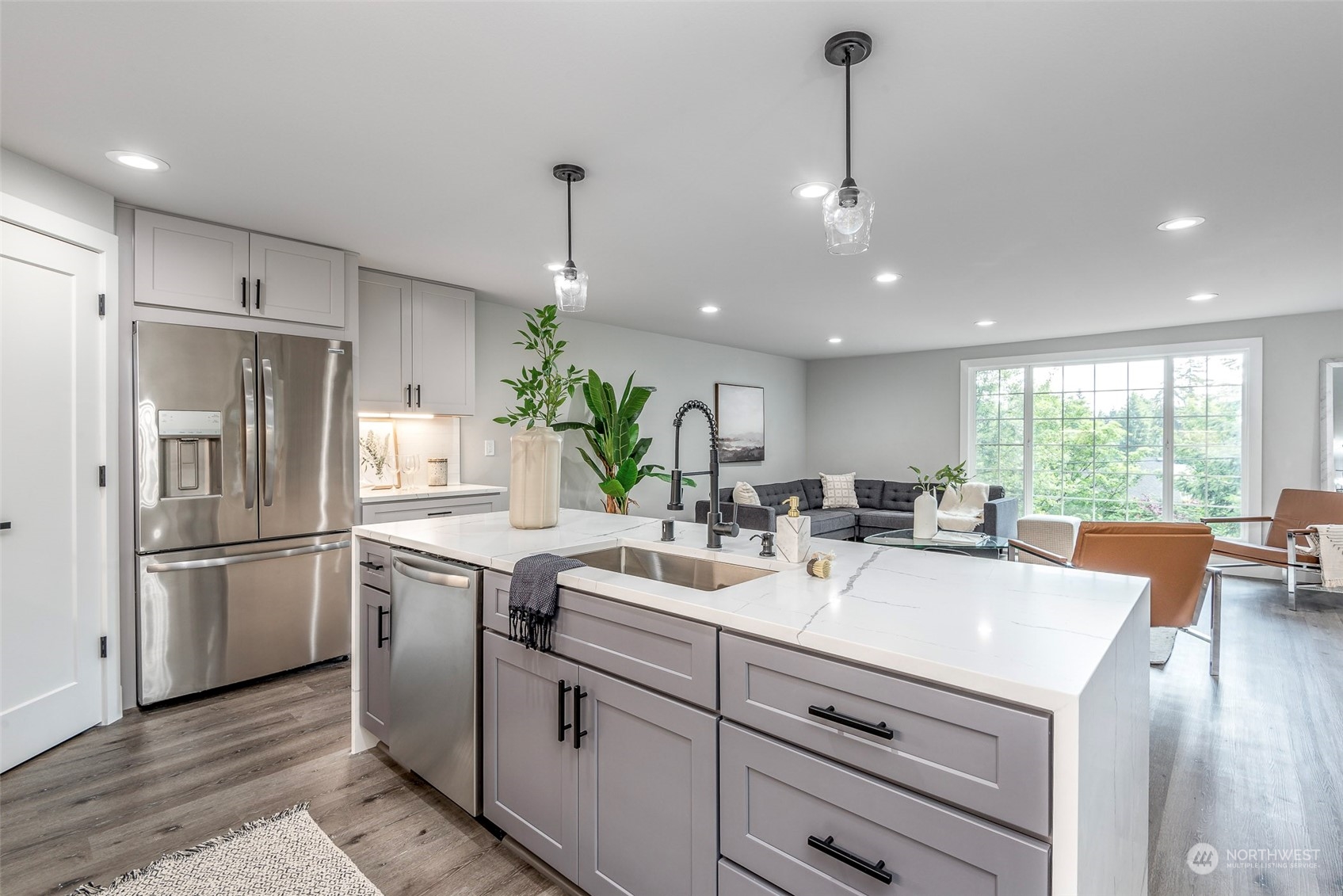1582 Rainier Drive Fircrest, WA 98466 - Photo 15 of 40 a kitchen with a sink stainless steel appliances and refrigerator