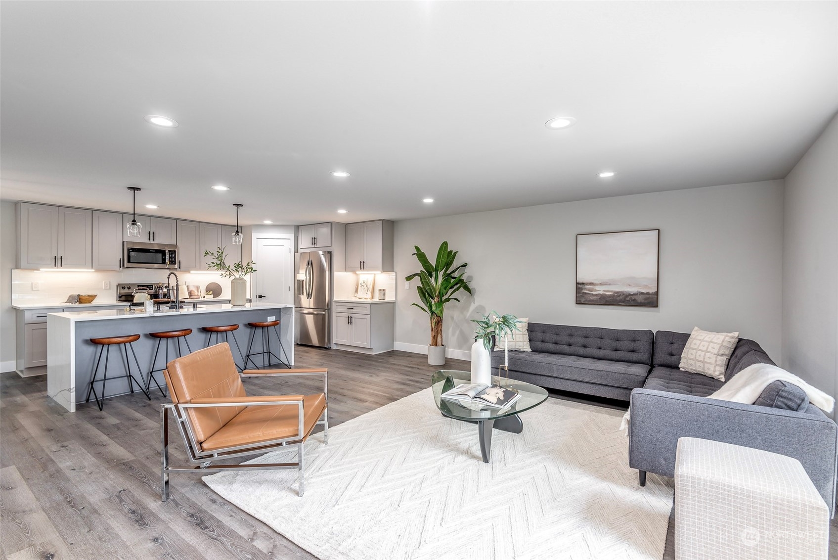 1582 Rainier Drive Fircrest, WA 98466 - Photo 16 of 40 a living room with furniture and kitchen view
