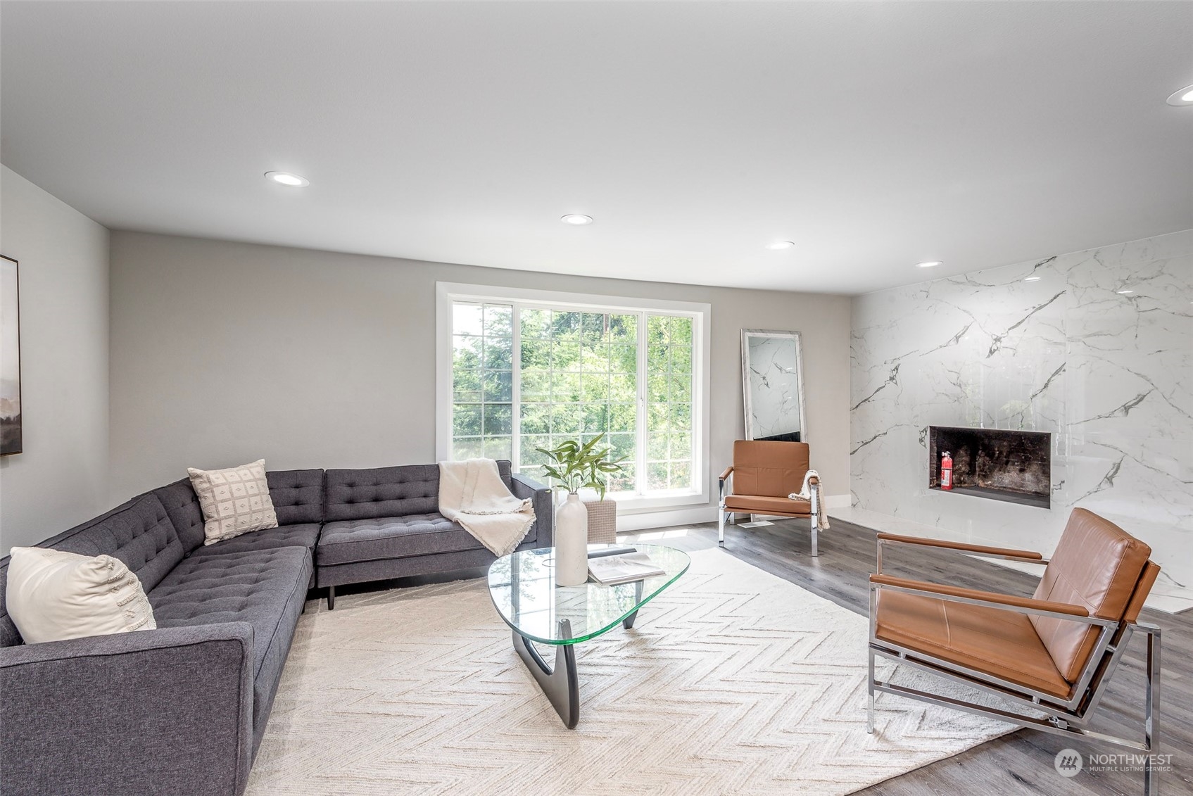 1582 Rainier Drive Fircrest, WA 98466 - Photo 19 of 40 a living room with furniture and a fireplace