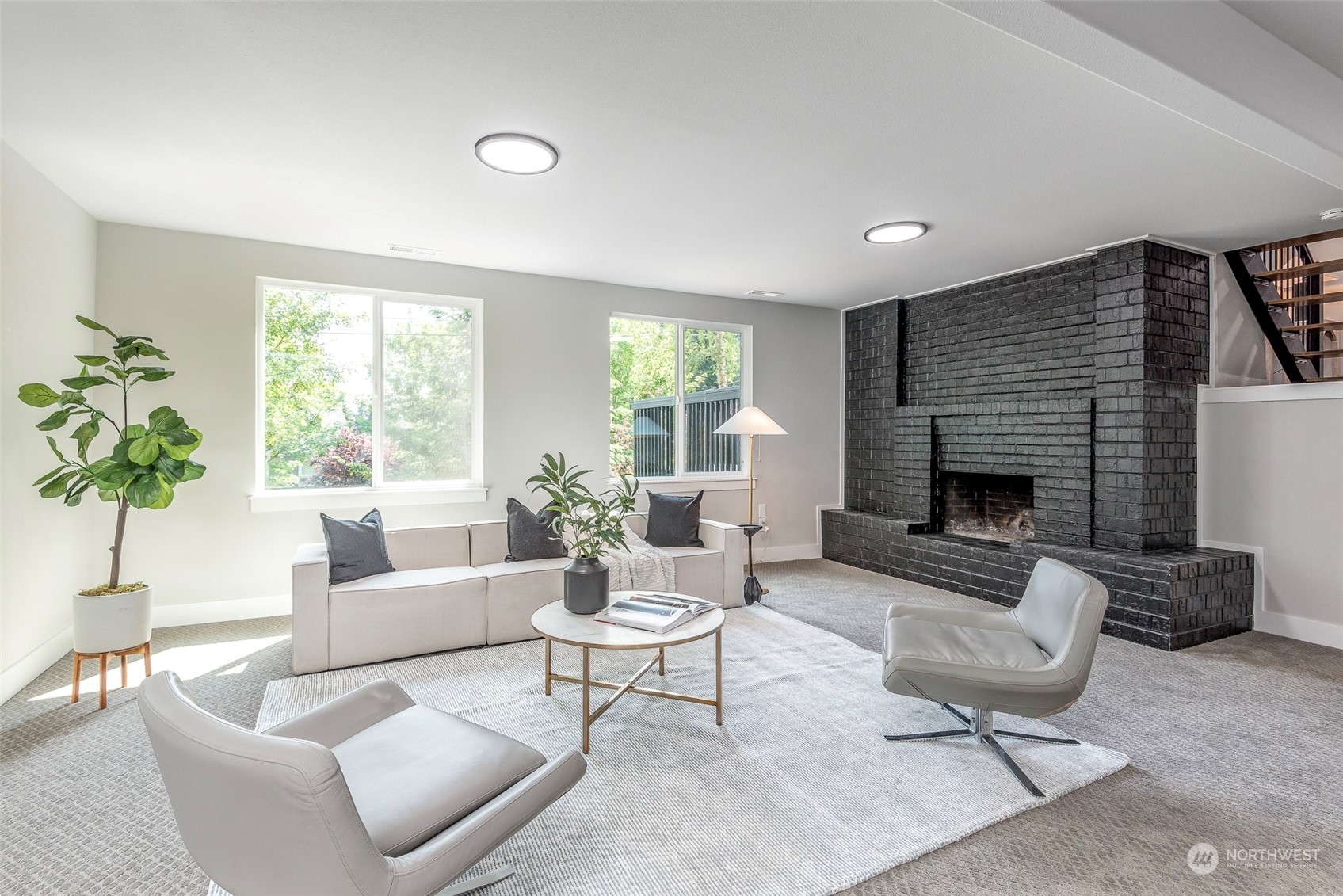 1582 Rainier Drive Fircrest, WA 98466 - Photo 21 of 40 a living room with furniture and a fireplace