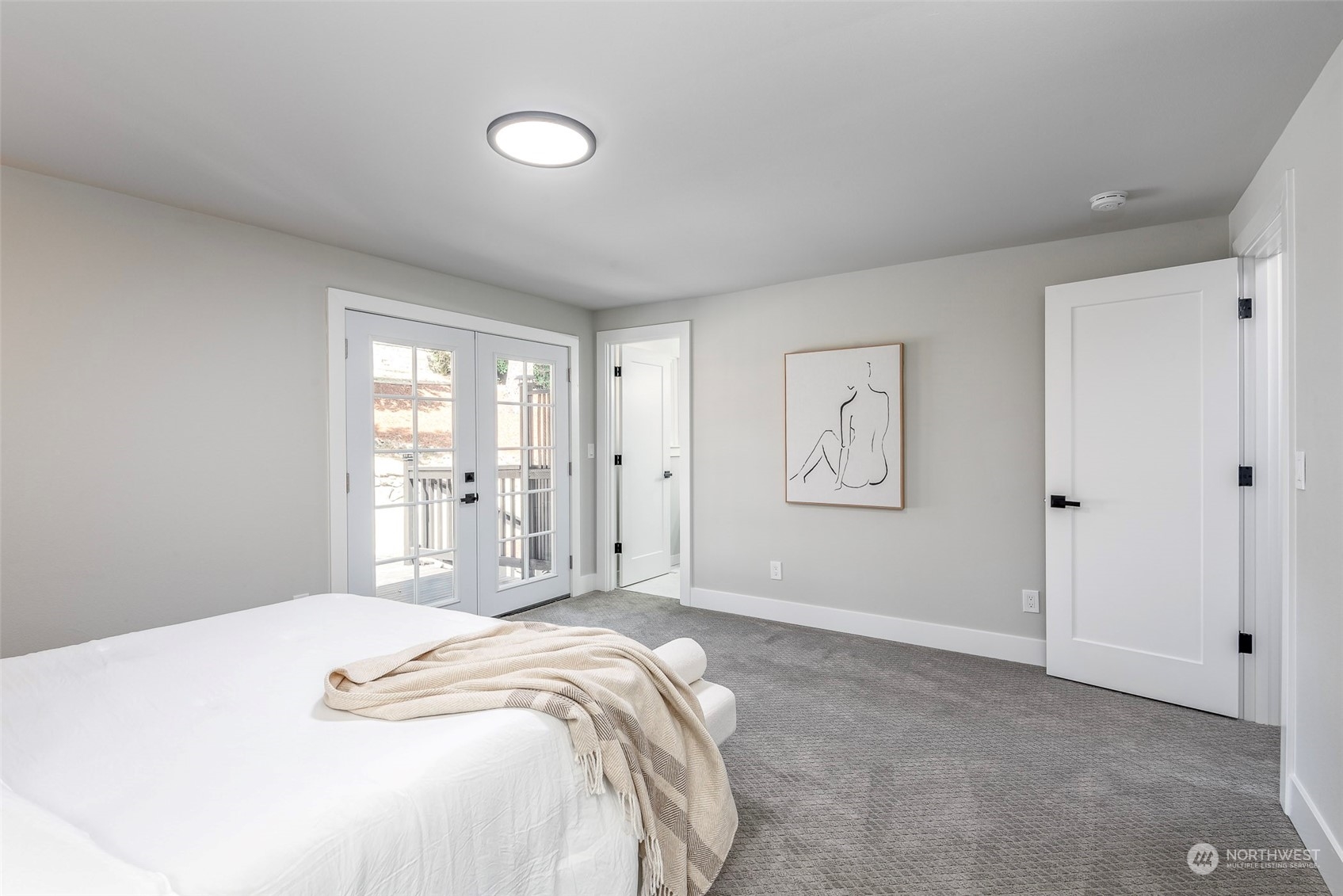 1582 Rainier Drive Fircrest, WA 98466 - Photo 27 of 40 a bedroom with a bed and a window