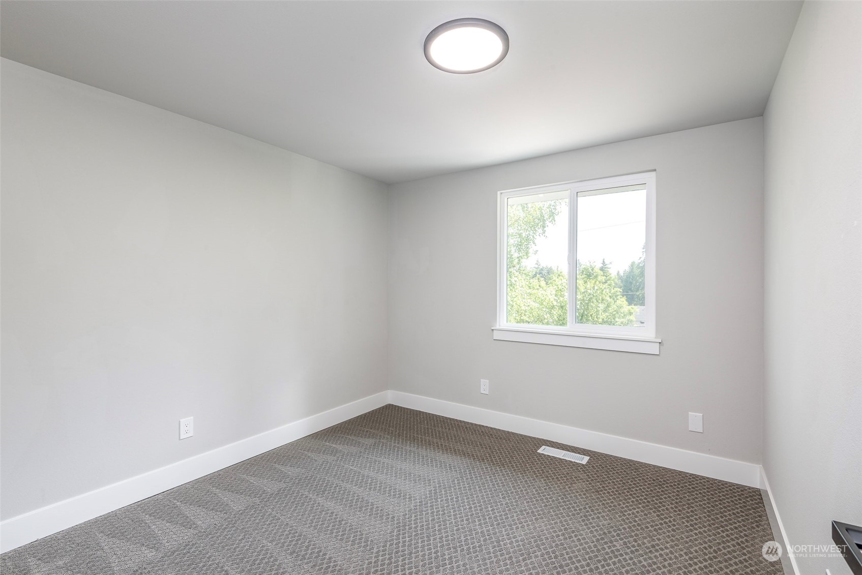 1582 Rainier Drive Fircrest, WA 98466 - Photo 29 of 40 an empty room with a window