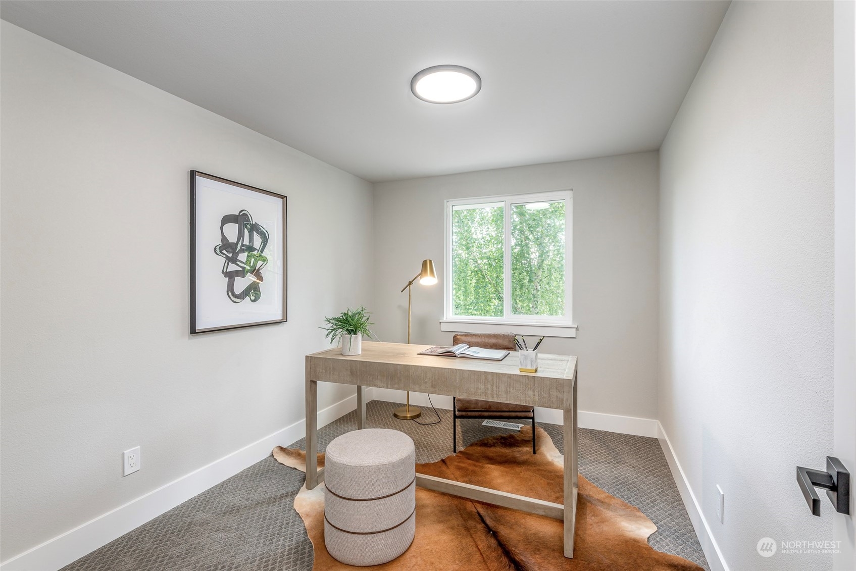 1582 Rainier Drive Fircrest, WA 98466 - Photo 30 of 40 a room with a table and windows