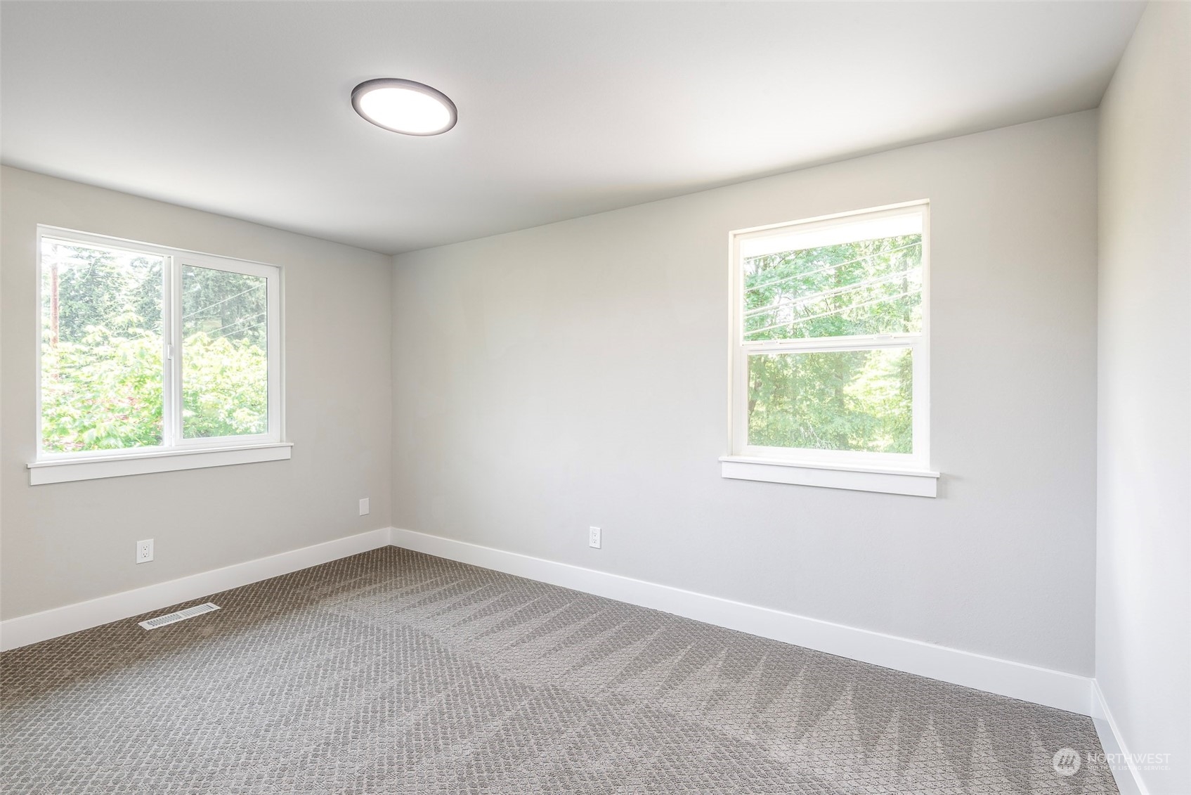 1582 Rainier Drive Fircrest, WA 98466 - Photo 33 of 40 an empty room with a window