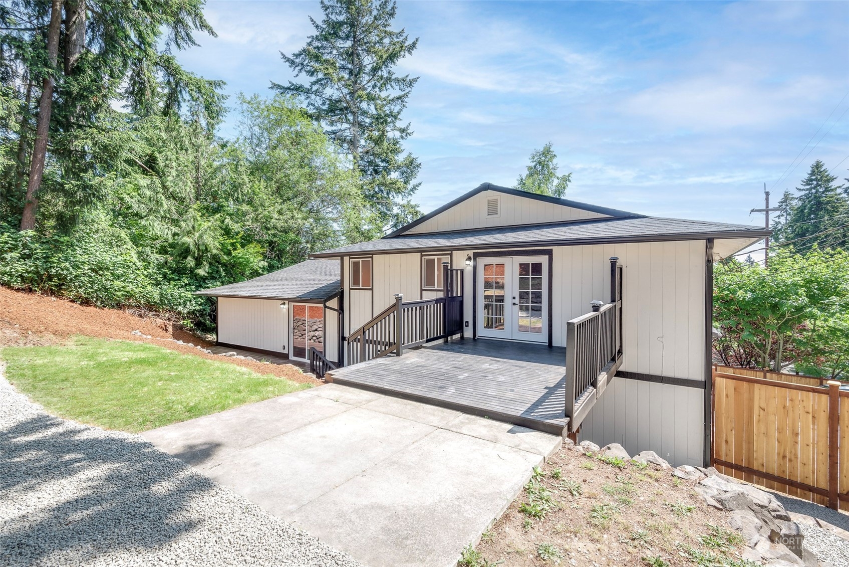 1582 Rainier Drive Fircrest, WA 98466 - Photo 36 of 40 a front view of a house with garden