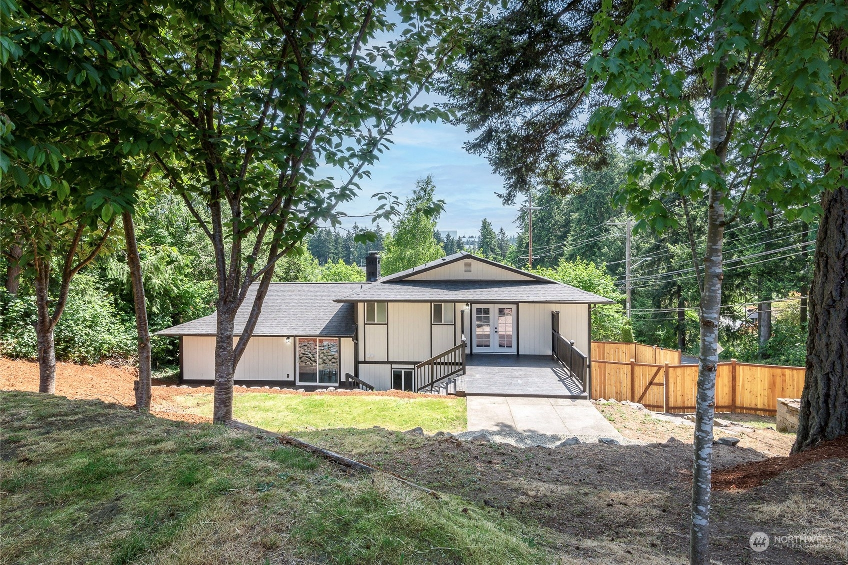 1582 Rainier Drive Fircrest, WA 98466 - Photo 38 of 40 a view of a house with a yard