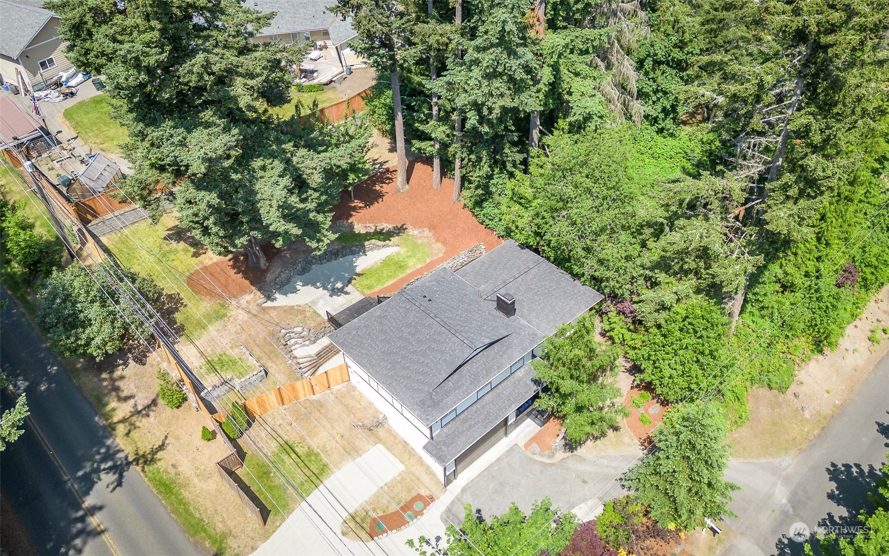 1582 Rainier Drive Fircrest, WA 98466 - Photo 39 of 40 an aerial view of a house with a yard
