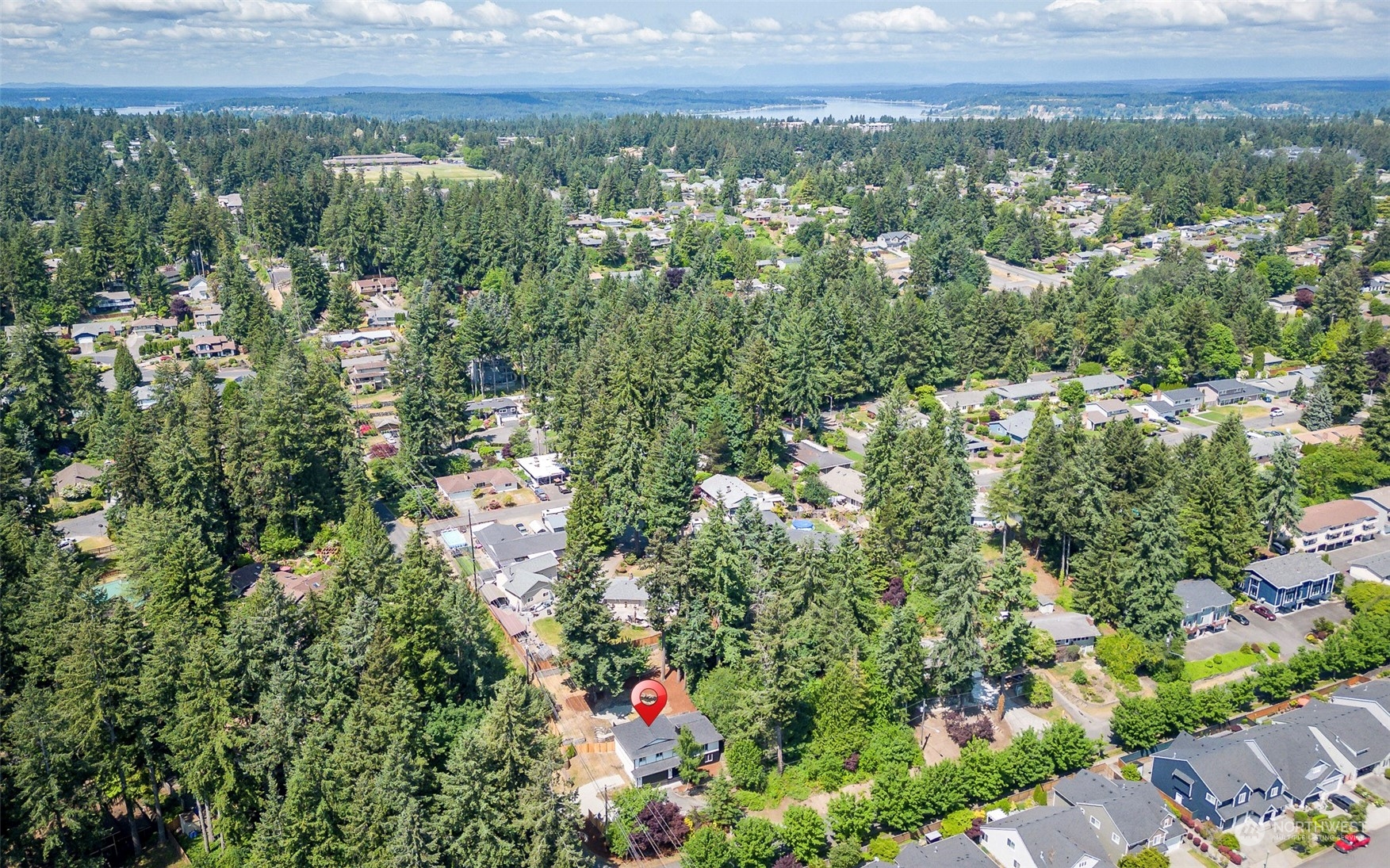1582 Rainier Drive Fircrest, WA 98466 - Photo 40 of 40 an aerial view of residential house with outdoor space and trees all around