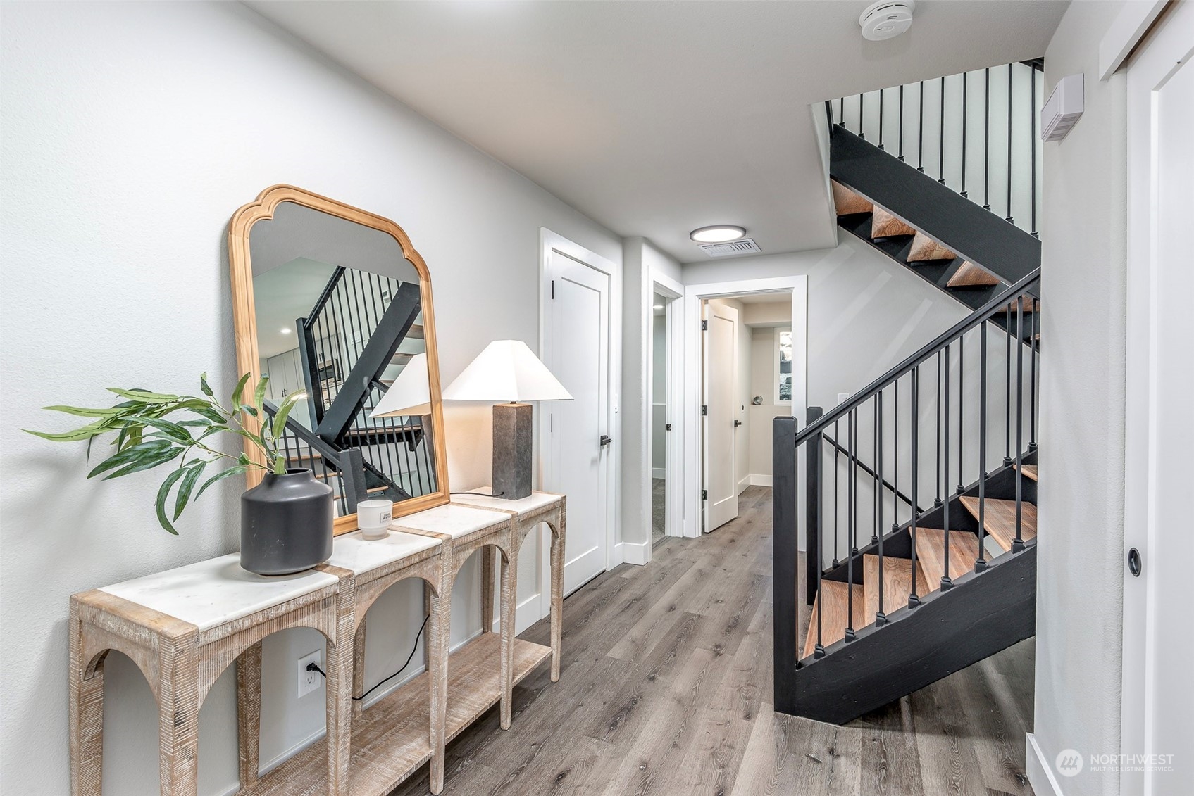 1582 Rainier Drive Fircrest, WA 98466 - Photo 7 of 40 a view of living room kitchen and entryway