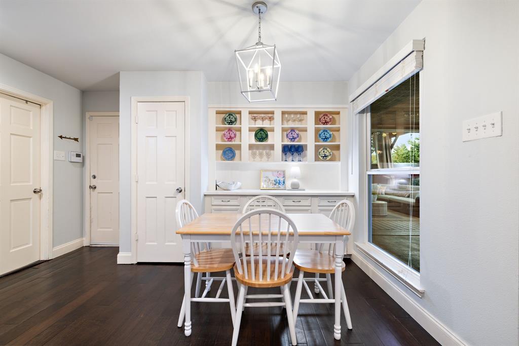 15935 Longvista Drive Dallas, TX 75248 - Photo 12 of 27 a view of a dining room with furniture window and wooden floor
