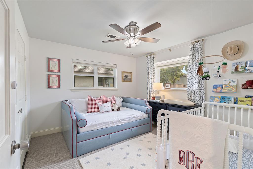 15935 Longvista Drive Dallas, TX 75248 - Photo 21 of 27 a living room with furniture and a window