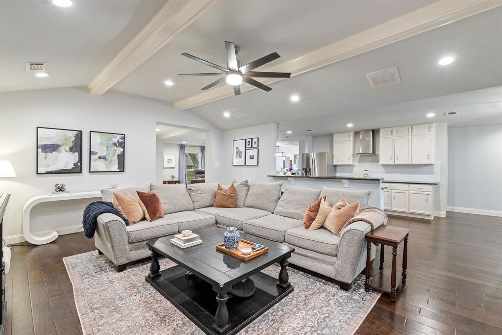 15935 Longvista Drive Dallas, TX 75248 - Photo 7 of 27 a living room with furniture and a view of kitchen