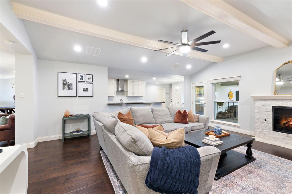 15935 Longvista Drive Dallas, TX 75248 - Photo 8 of 27 a living room with furniture and a fireplace