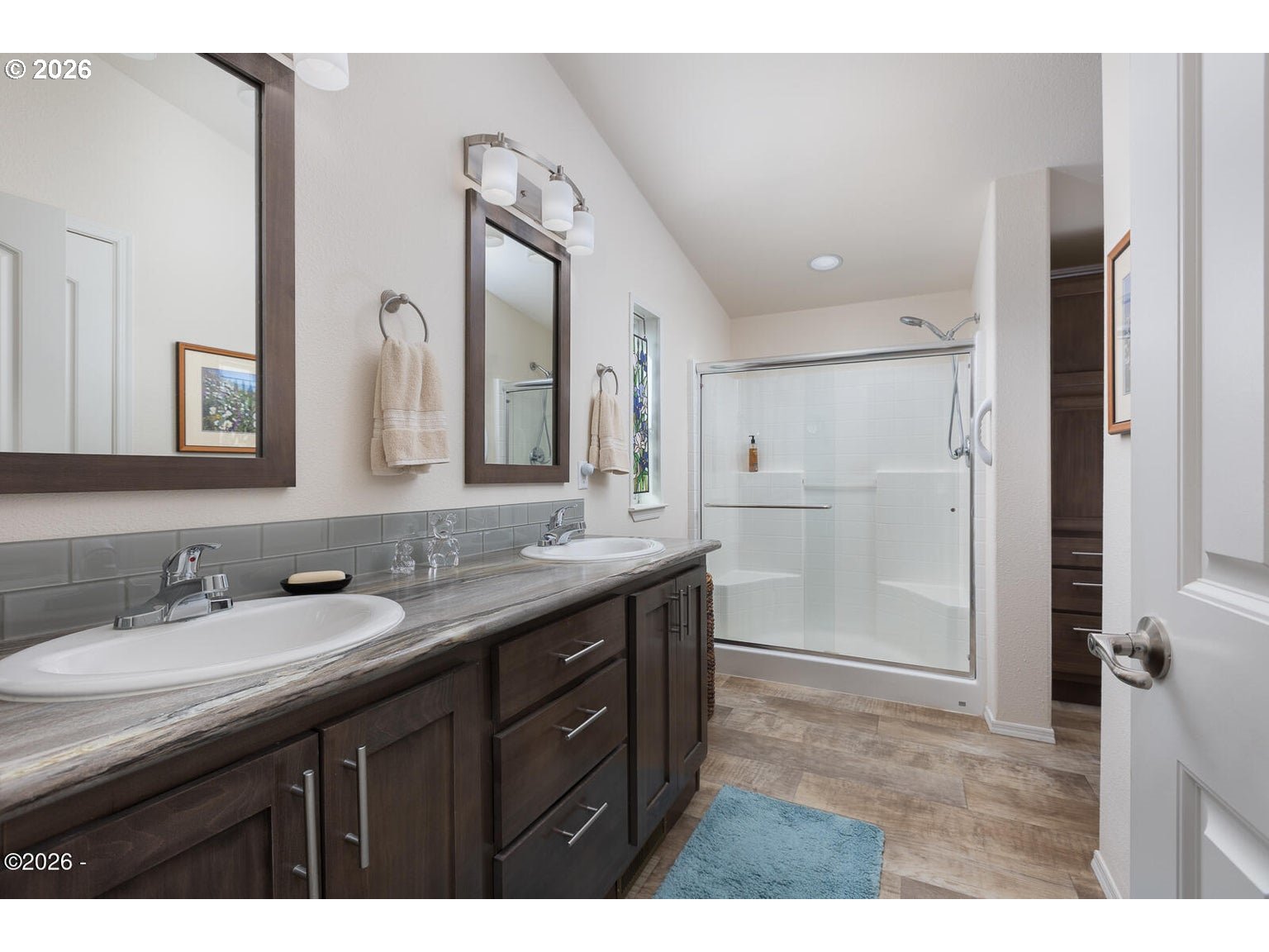 777 Southeast Winchell Street Depoe Bay, OR 97341 - Photo 13 of 29 a bathroom with a granite countertop sink mirror and a