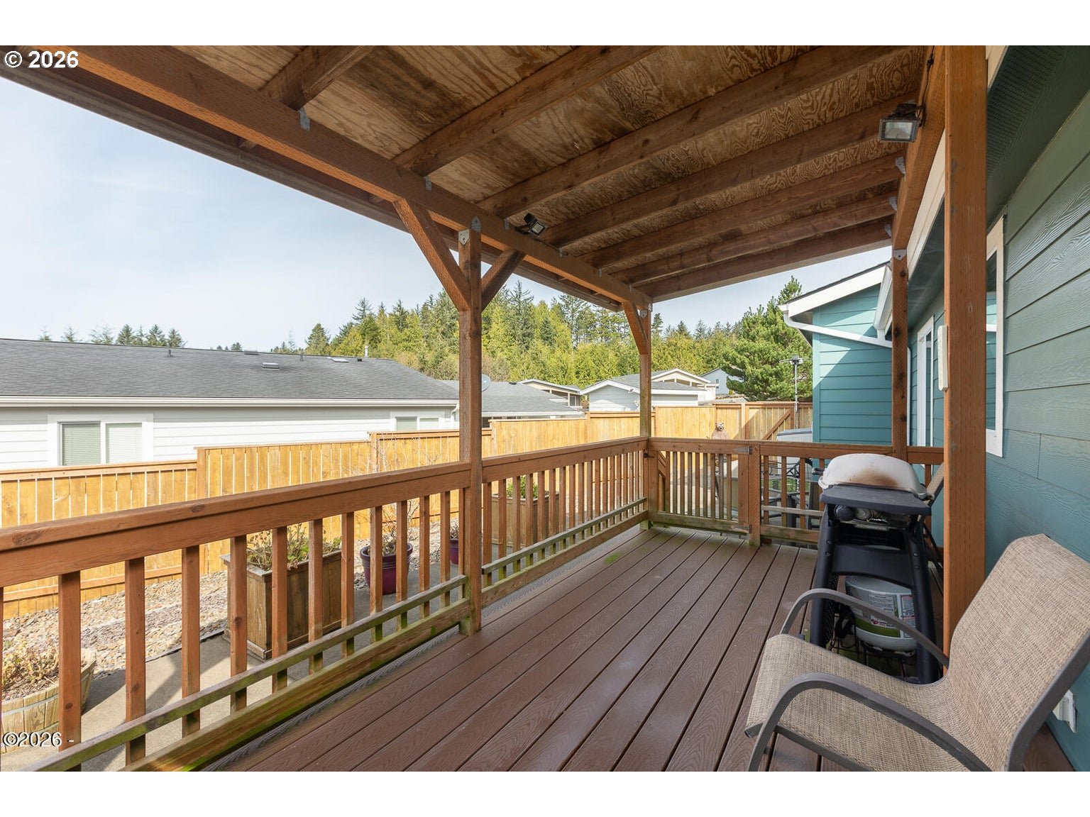 777 Southeast Winchell Street Depoe Bay, OR 97341 - Photo 20 of 29 a balcony with wooden floor