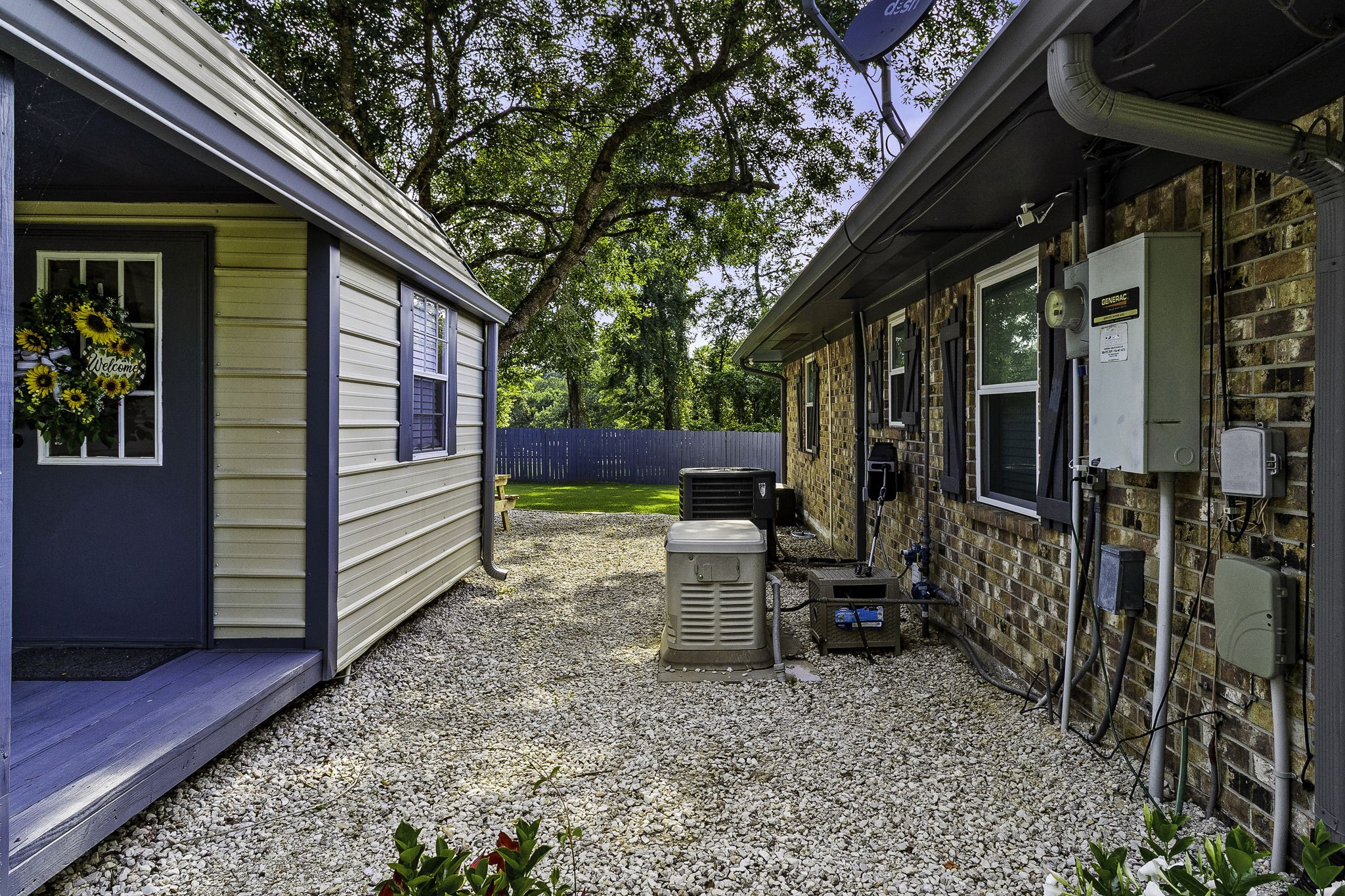 188 Huckleberry Road Onalaska, TX 77360 - Photo 26 of 49 a view of chairs and in the backyard