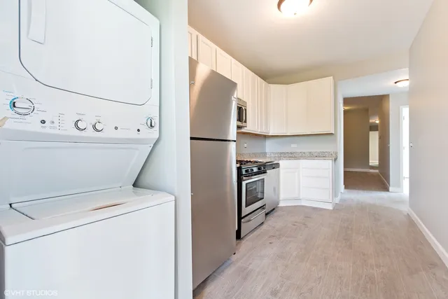 a view of kitchen with washer and dryer