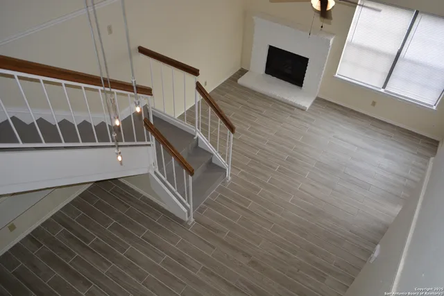 a view of a house with a tree