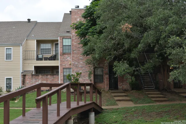 a view of a lake with a sitting area