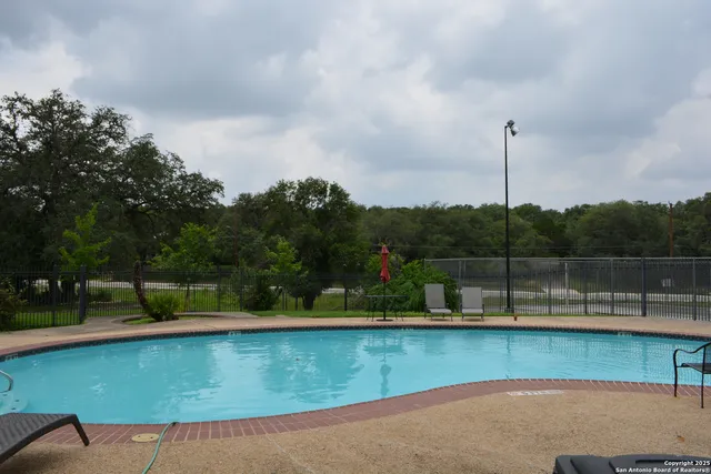 a view of a bench in a garden