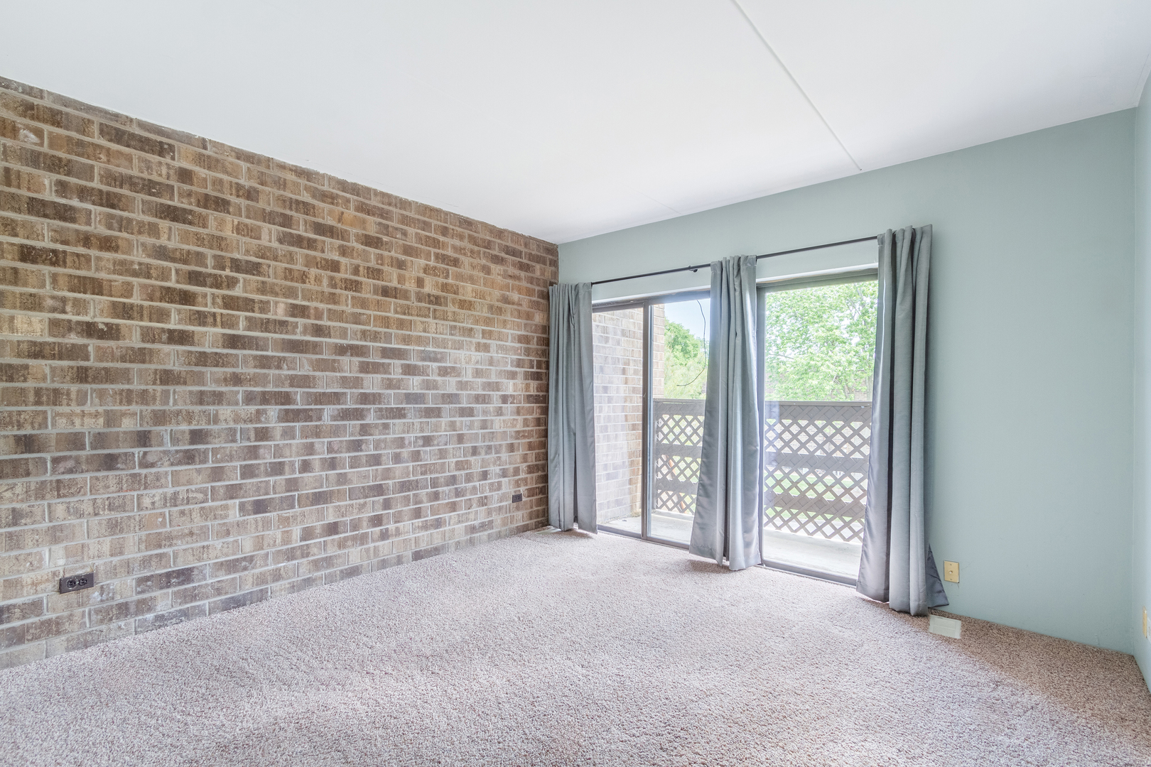 1010 Kenneth Circle Elgin, IL 60120 - Photo 11 of 18 a view of an empty room with a window