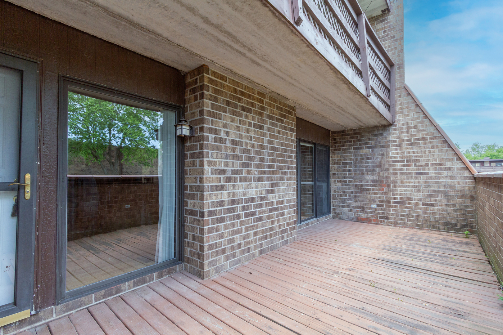 1010 Kenneth Circle Elgin, IL 60120 - Photo 3 of 18 a view of an empty room with wooden floor and a window