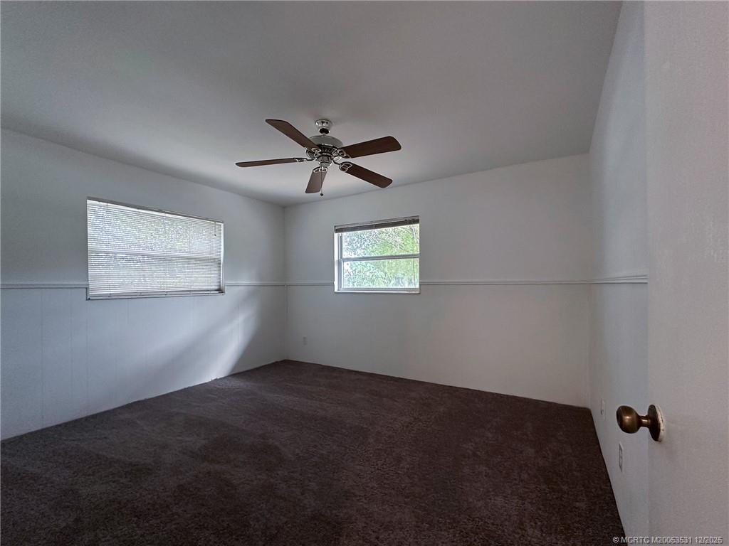 1739 Southeast Madison Street Stuart, FL 34997 - Photo 14 of 38 a view of a big room with carpet
