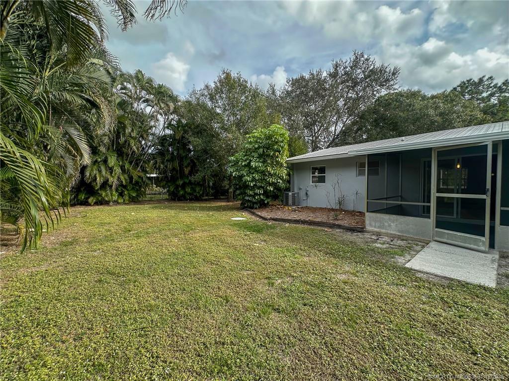 1739 Southeast Madison Street Stuart, FL 34997 - Photo 34 of 38 a view of backyard with green space
