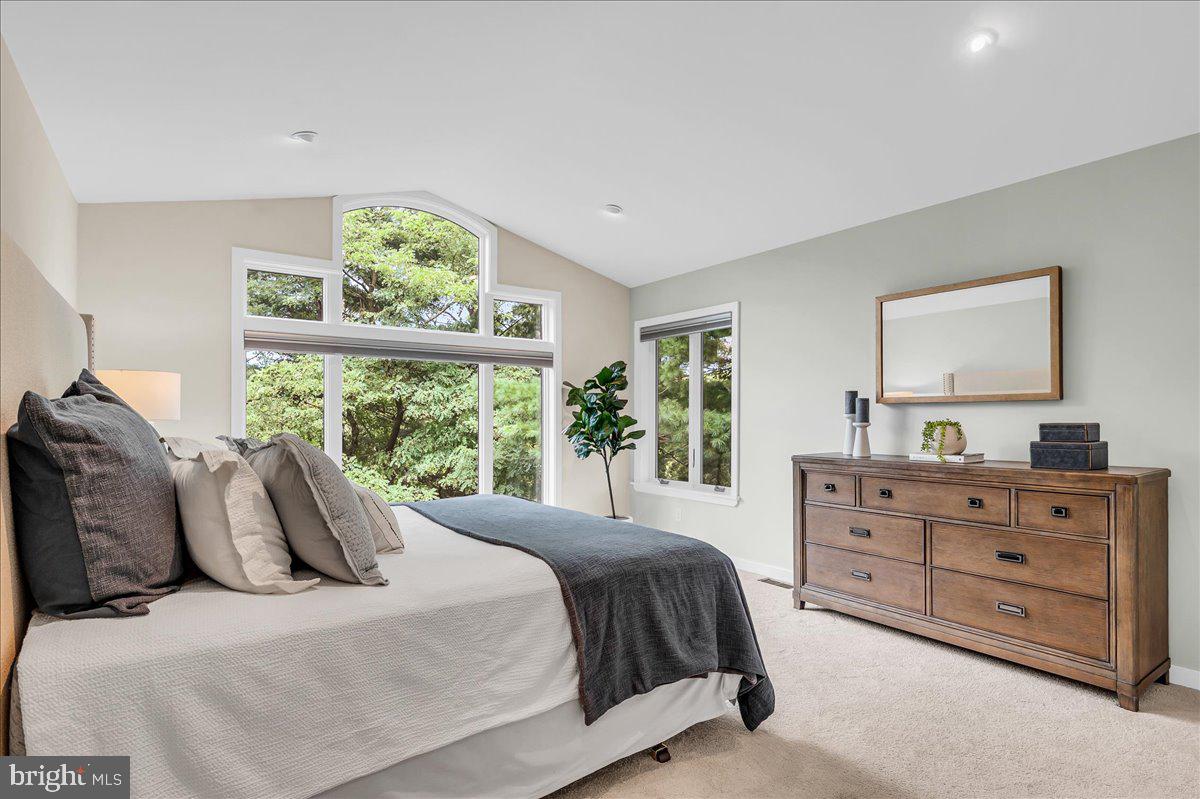 977 Wind Song Road West Chester, PA 19382 - Photo 25 of 57 a bedroom with a bed and a dresser