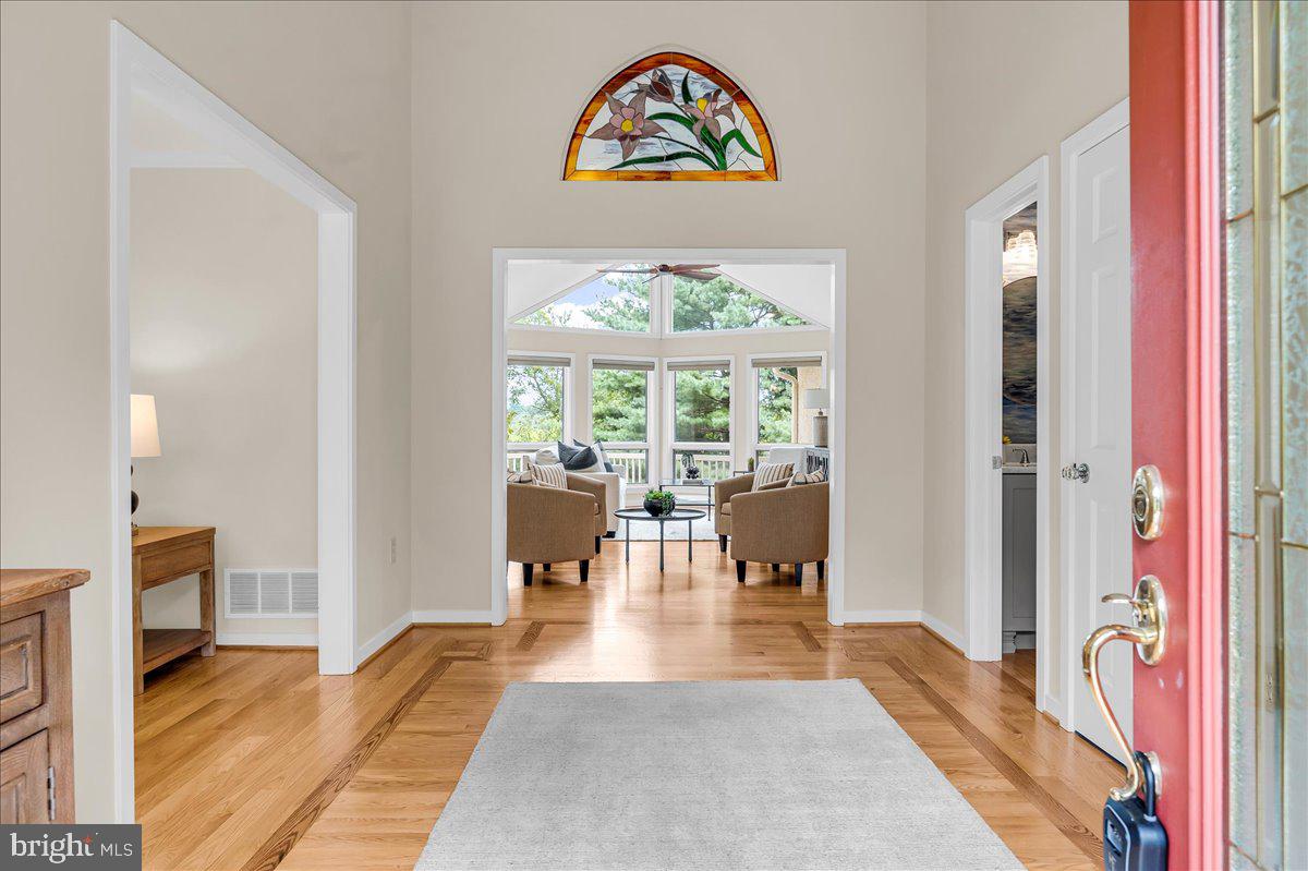 977 Wind Song Road West Chester, PA 19382 - Photo 3 of 57 a view of an entryway with wooden floor