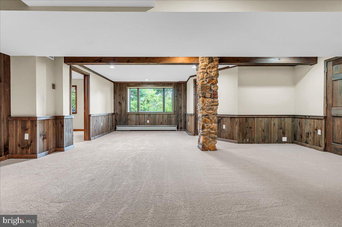 977 Wind Song Road West Chester, PA 19382 - Photo 37 of 57 a view of an empty room with a fireplace