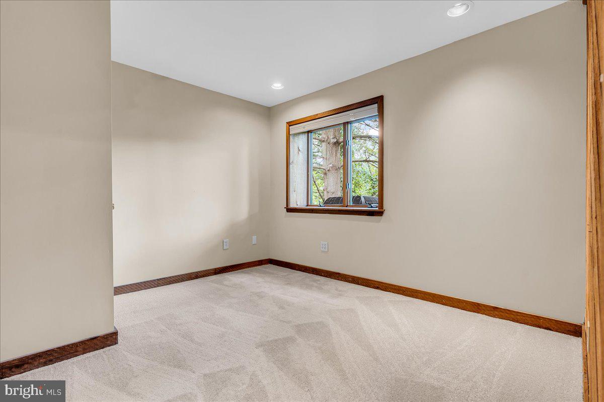 977 Wind Song Road West Chester, PA 19382 - Photo 40 of 57 an empty room with windows