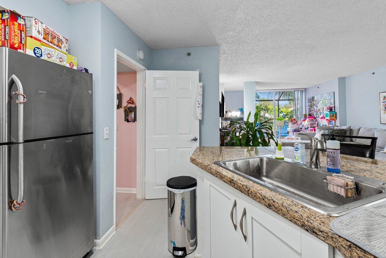 3111 Clint Moore Road Boca Raton, FL 33496 - Photo 8 of 27 008-3111ClintMooreRoad-101-BocaRaton-FL-
