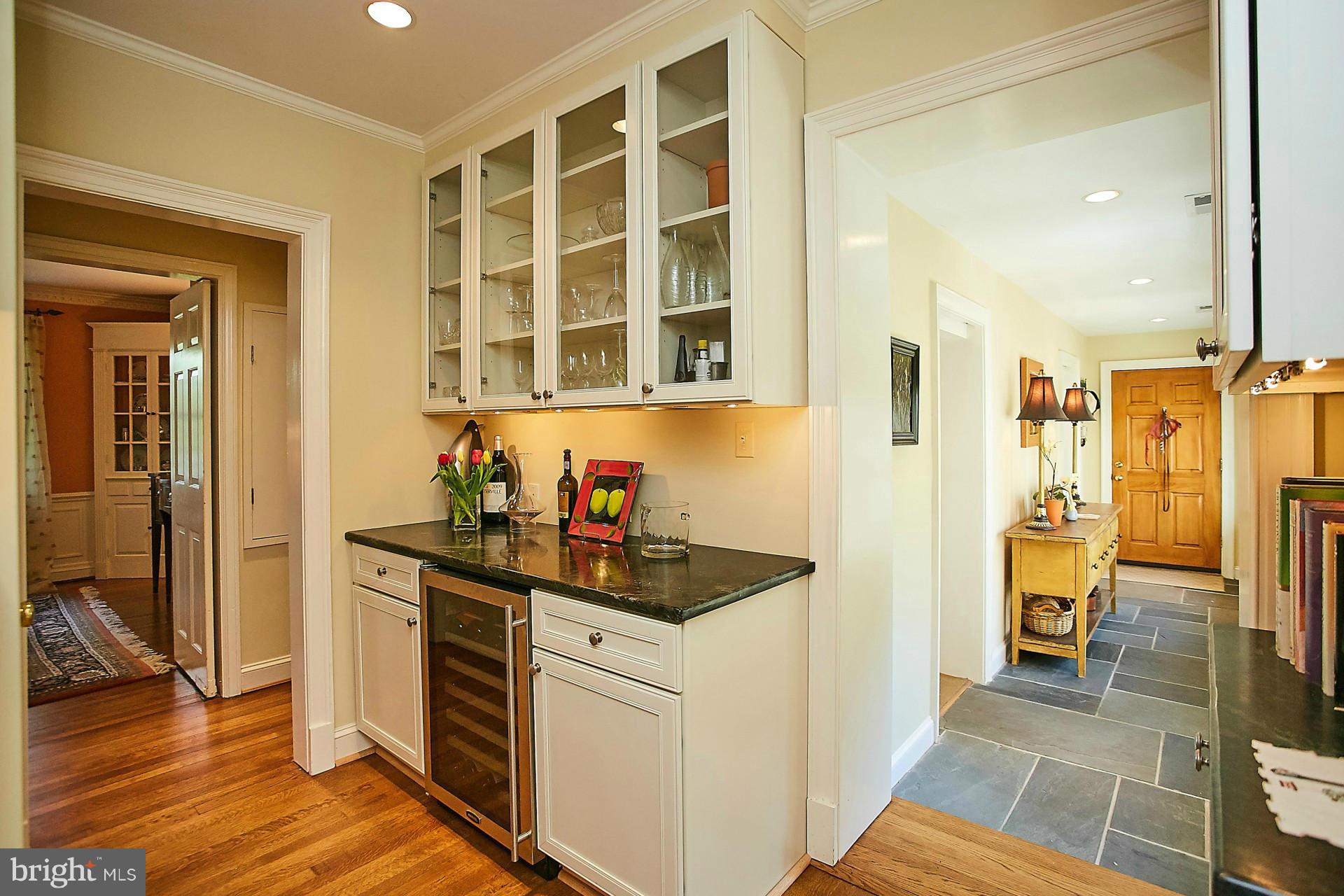 6539 Georgetown Pike McLean, VA 22101 - Photo 17 of 30 a kitchen with stainless steel appliances granite countertop a refrigerator and a sink