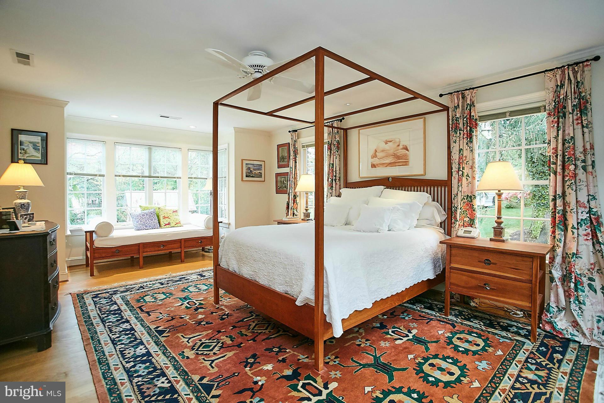 6539 Georgetown Pike McLean, VA 22101 - Photo 19 of 30 a bedroom with bed and wooden floor