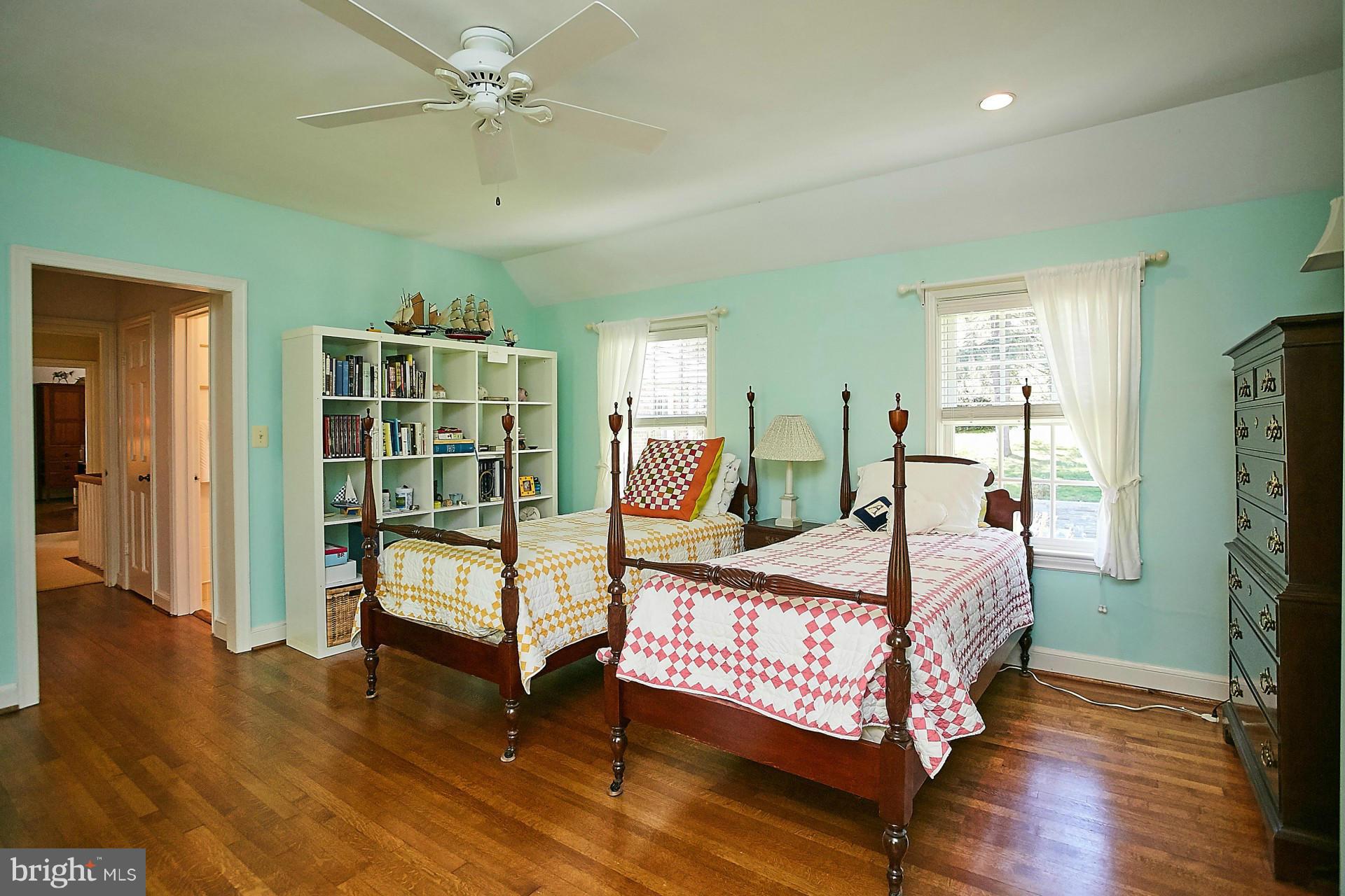 6539 Georgetown Pike McLean, VA 22101 - Photo 25 of 30 a bedroom with a bed and wooden floor