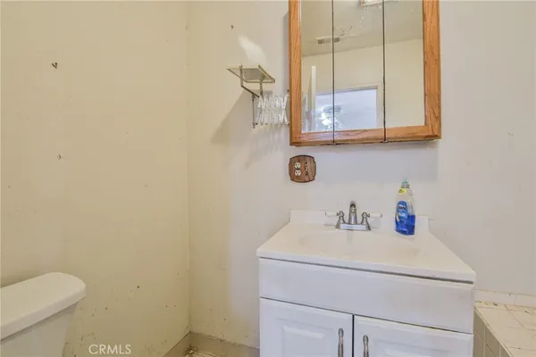 a bathroom with a sink and a toilet