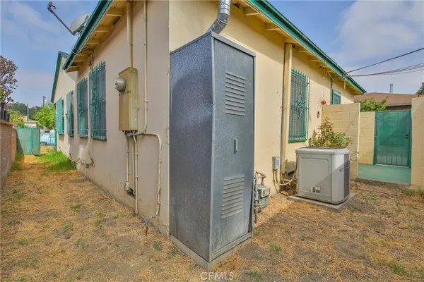 a view of a backyard of the house