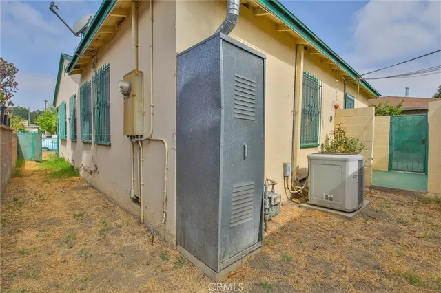 a view of a backyard of the house