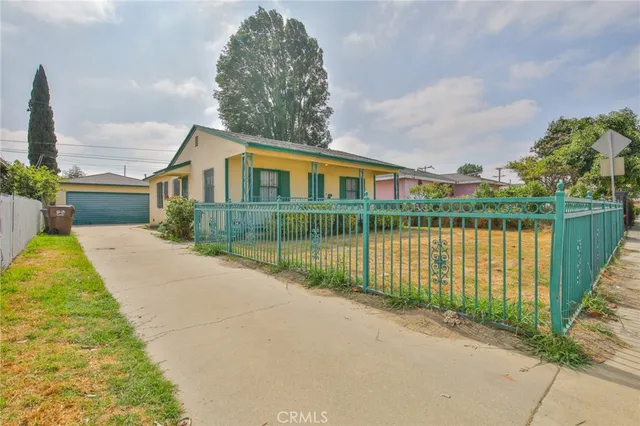 a aerial view of a house with a yard from a terrace